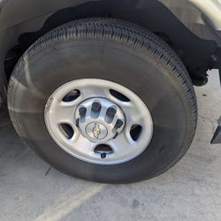 LT245-75-16 Bridgestone V-Steel 10 Ply Tires, Only 5000 Miles, With Factory 6 Lug Wheels, Center Caps And Lug nuts. No Patches, Like Brand New.