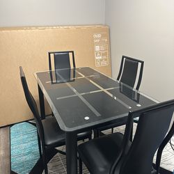 Dinning tables and  4 chairs