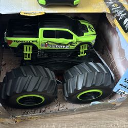 NEGOTIABLE - Motor Days Raptor Dinomite R/C Monster Truck - Vapor Spray, Lights & Sound!