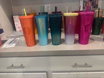 Starbucks cups . Tumblers