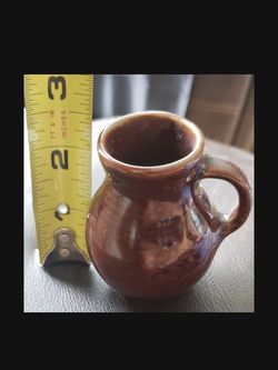 Vintage antique miniature brown salt grill Lays and picture applied handle 2 1/2 inches tall