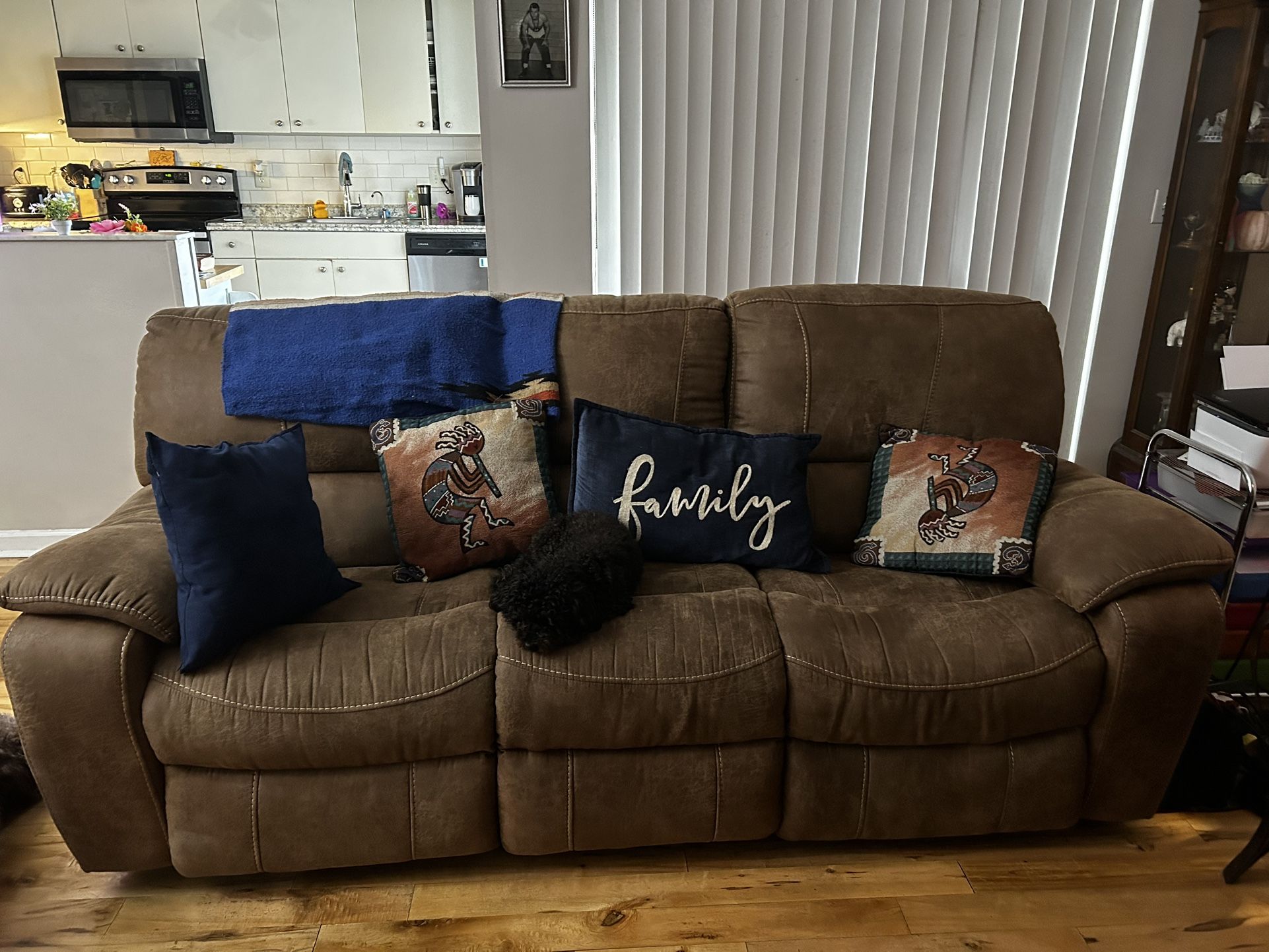 Reclining couch and loveseat with FREE coffee table and One end tables