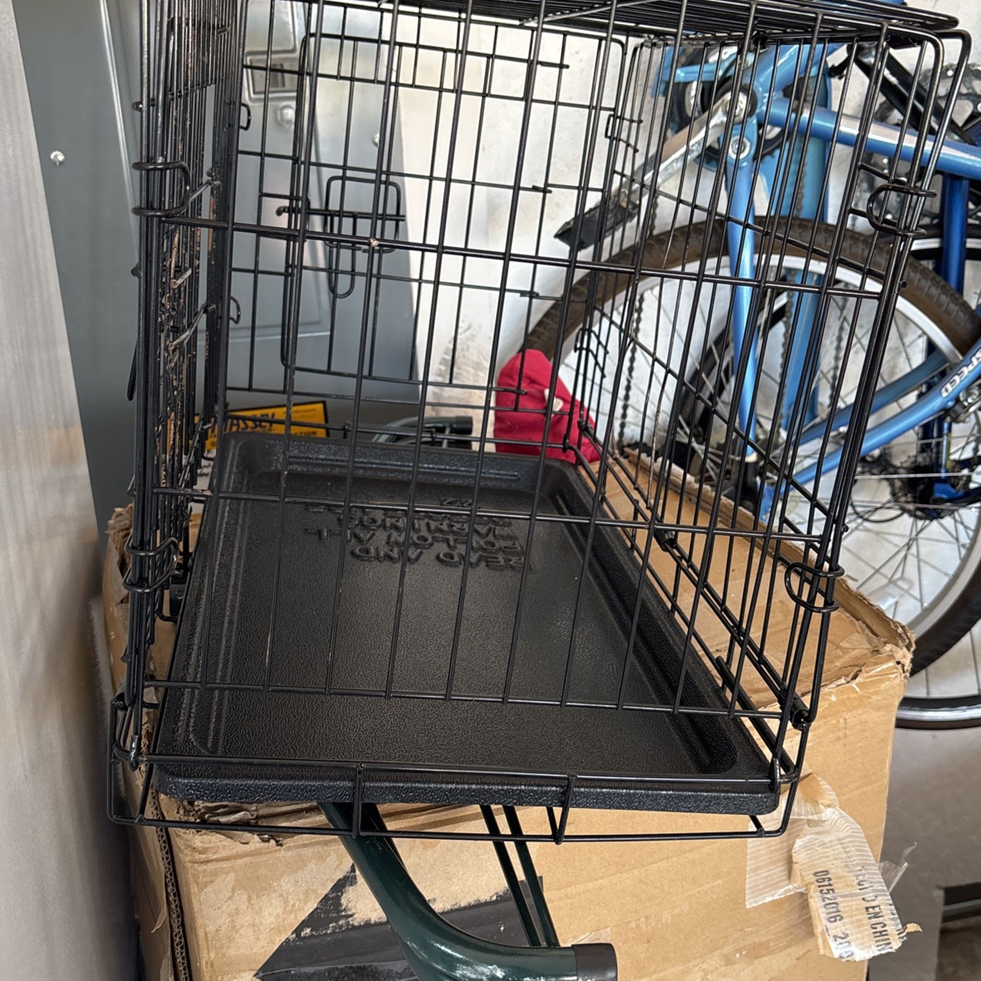 small dog cage.