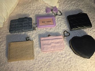 Juicy  couture  small wallets new 10.00 each or all for 50