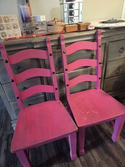 Two Pink Wooden Chairs