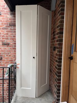 Pair of Solid Wood Bi-Fold Doors