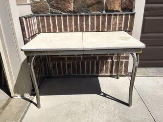 Mid Century chrome table with new table cloth