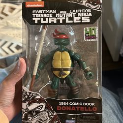 This is a Playmates 1984 Comic Book Donatello action figure from the Teenage Mutant Ninja Turtles Ninja Elite Series