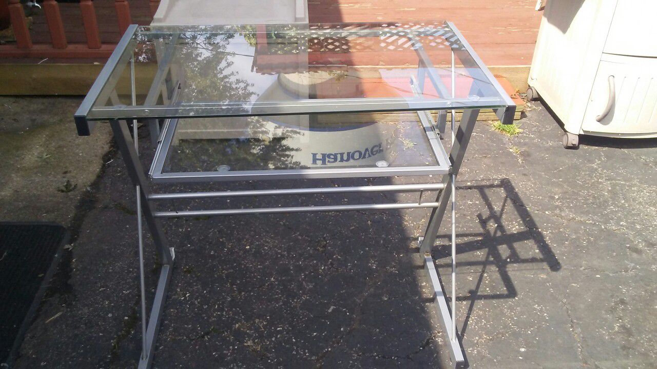Glass Computer table with matching side table. ( Not pictured )
