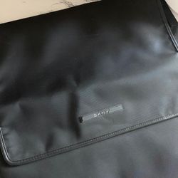 New DKNY Black Messenger Bag. New with tags. Never worn/used. 