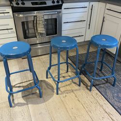 Three Blue IKEA Raskog Counter Height Stools