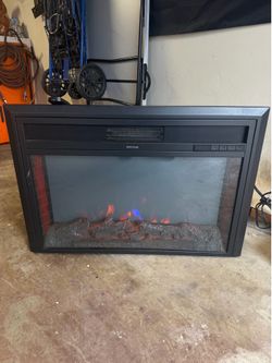 Fireplace insert heater