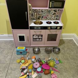 Kids play kitchen with play food 