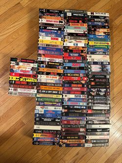 125 VHS tapes vintage horror, sci-fi, comedy, action, rock band