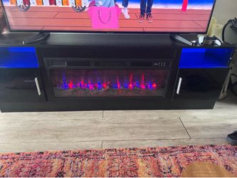Tv stand with fireplace