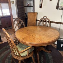 Solid Oak Kitchen Table w/ 4 Chairs & Pads and Leaf