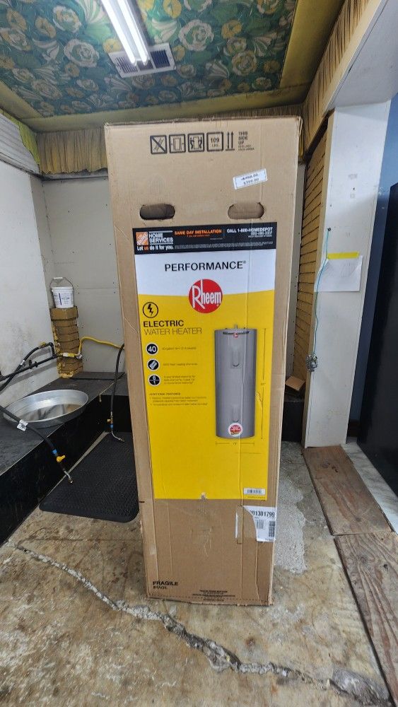 PERFORMANCE RHEEM ELECTRIC WATER HEATER WITH 1YEAR WARRANTY/1AÑO DE GARANTIA POR ESCRITO