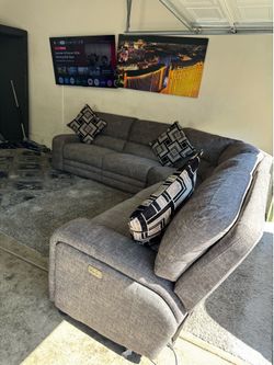 * Like new * Ashley Furniture electric gray sectional sofa ( Free Delivery )
