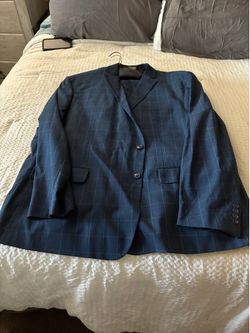 Three mens suits