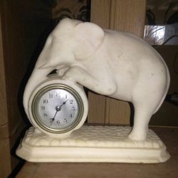 Elephant clock make offer