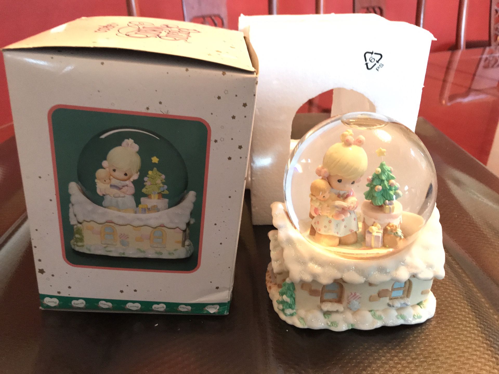 Brand new Precious Moments snow globe music box