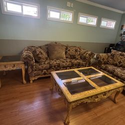 Sofa loveseat one end table and a coffee table