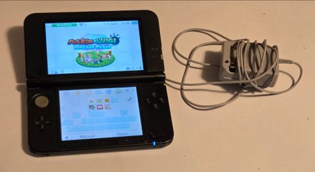 3DS XL Silver Mario & Luigi Dream Team edition + 5 Free Carts
