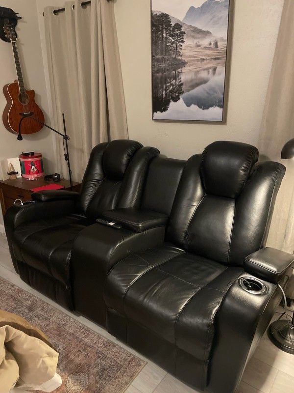 Black Dual Reclining Electric Love Seat.  Lights Up Blue. Like New