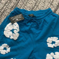 Blue denim tear shorts