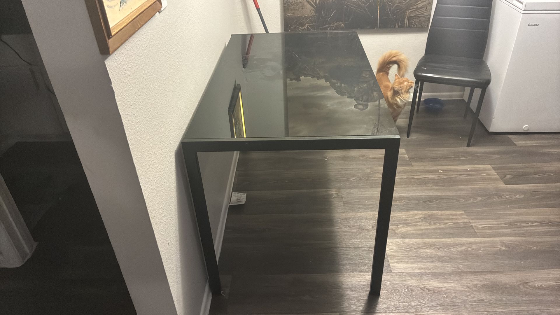 Black glass table with black metal frame