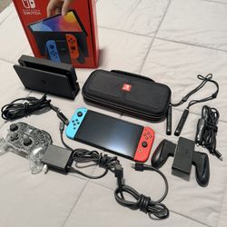 Nintendo Switch – OLED Model w/ Neon Red & Neon Blue Joy-Con