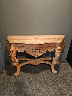 Beautiful French-Provincial oak console. Curvy hand-carved