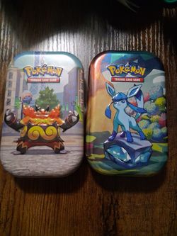 2 mini tins with mystery cards