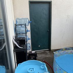 Water Dispenser And Tower To Hold Them