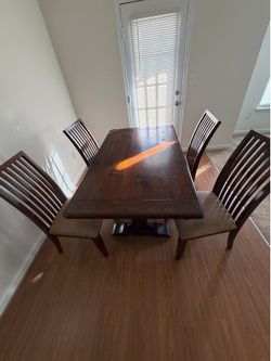 Dining room table with four chairs