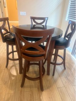 Round Pub Table with 4 Swivel Barstools