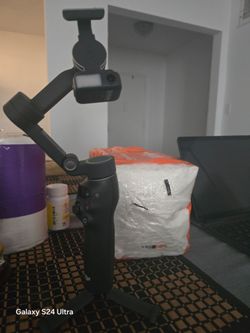 This item appears to be a DJI Osmo Mobile 7P Smartphone Gimbal.