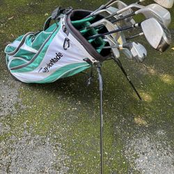 2 Sets Of Golf Clubs