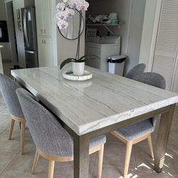 like new macys marble dining table and  4 chairs from crate barrel.   excellent condition and barely used. 