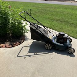 Perfect running push lawnmower with bag starts on the first pull,,I even accept, broken mowers traded in.