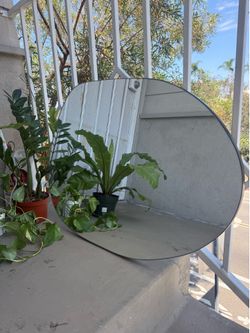 Asymmetrical cloud mirror - $80 OBO