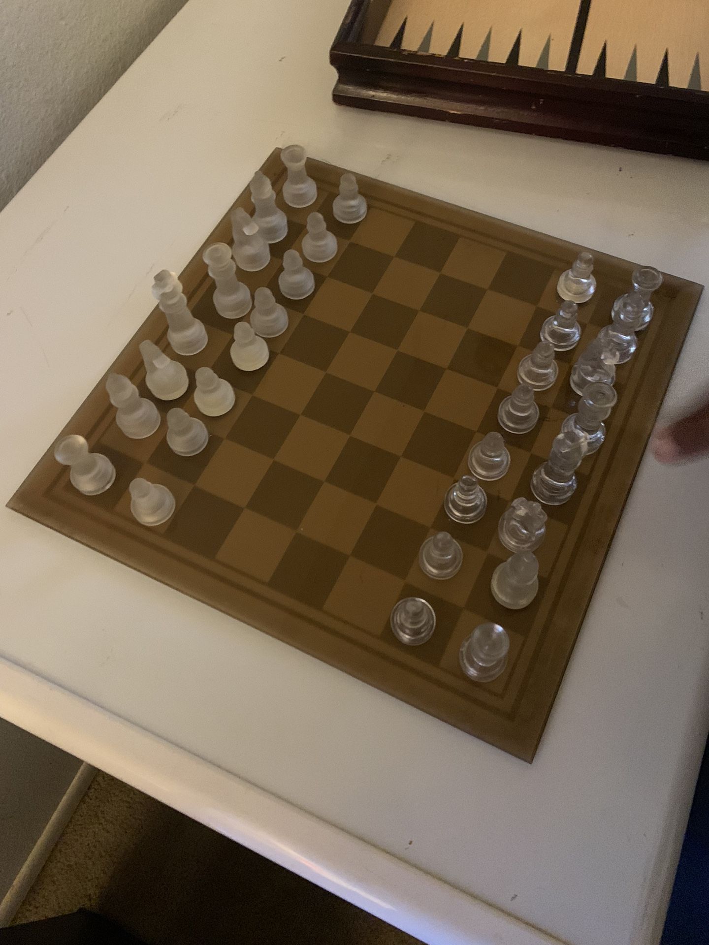 Chess set all glass and backgammon board, dominos and poker dice