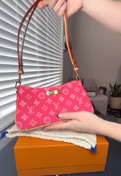 Hot pink Louis Vuitton bag