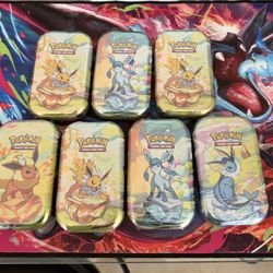 POKEMON PRISMATIC EVOLUTIONS TINS