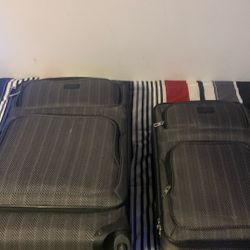 Two Grey Suitcases