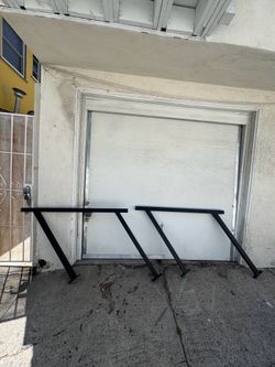Black 3 or 4 stair metal hand rails