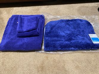 New royal blue bath rug and towels, college dorm or apartment