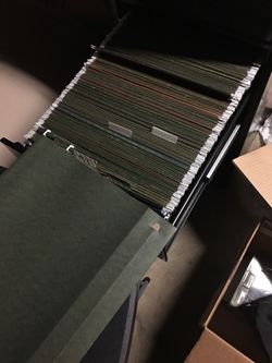 Lots of file holders for file cabinet