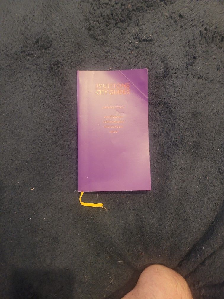 Assortment Of Louis Vuitton Catalogs And Magazines