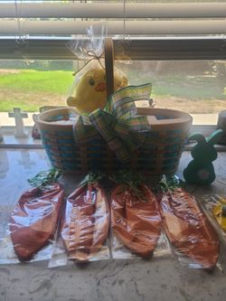 Variety of easter items. Basket . Carrot bags for candy .. chick bunny